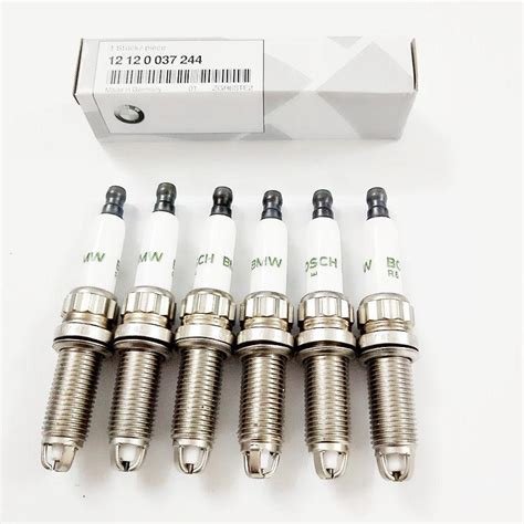 bmw spark plug change cost