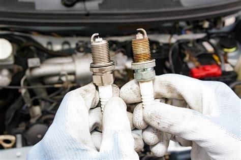 car running rough after spark plug change