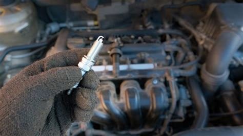 how long to let engine cool before changing spark plugs