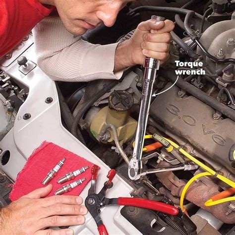 is changing spark plugs hard